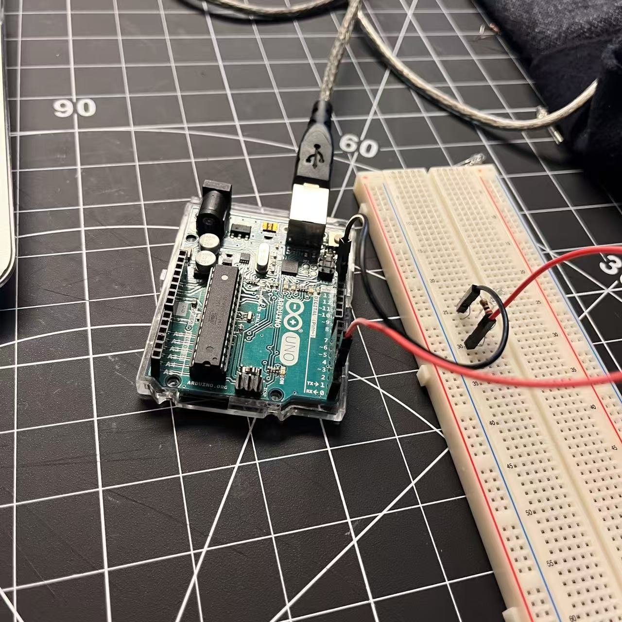 By wiring LEDs and resistors on the breadboard, I learned how to make the lights blink through coding.