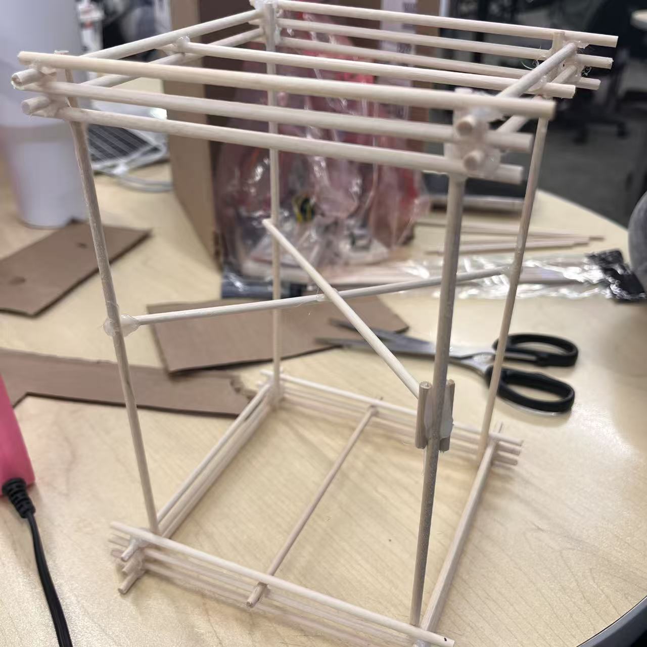 The first assembled wooden frame, testing structural stability and spacing for the electronics.